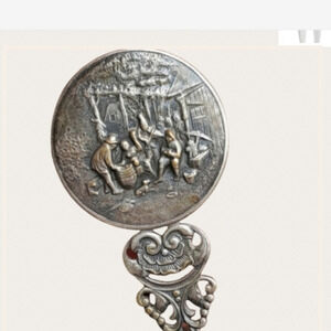 Vintage silver‎  Repousse hand mirror